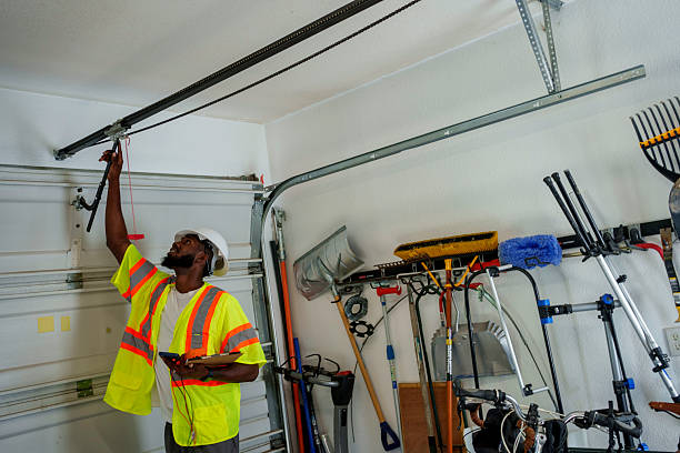 Professional Garage Door Roller Replacement technician working in East Hills, NY
